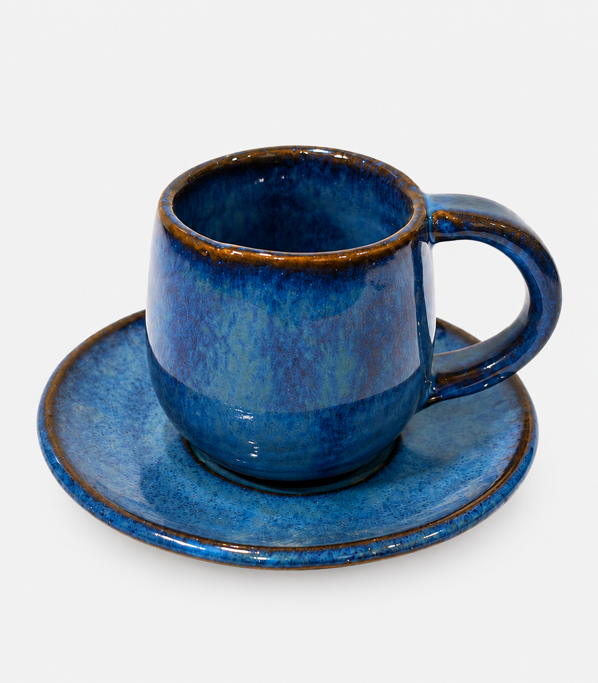 111 Blue Glazed Ceramic Cup & Saucer - Image 1